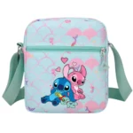 Torebka listonoszka Stitch i Angel – mała torba na ramię Disney w pastelowych kolorach błękitno-różowych z regulowanym paskiem