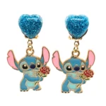 Kolczyki klipsy z brokatowym serduszkiem i stitchem w złotej oprawie